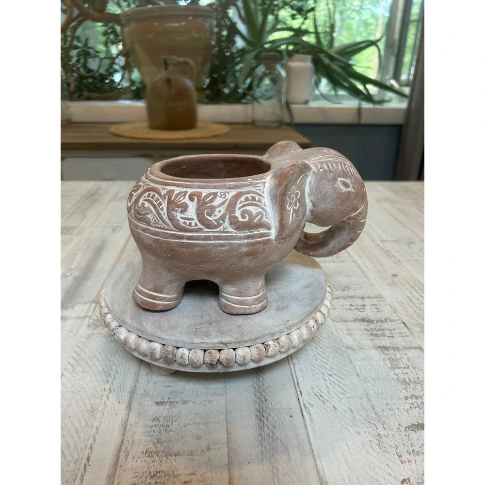 Terracotta white washed elephant‎ planter.